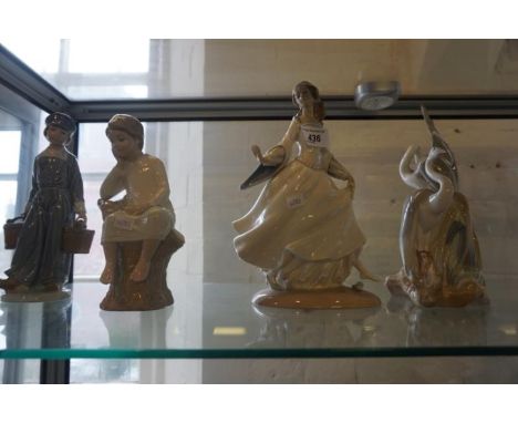 Three Lladro and one Nao figure group depicting a Dutch milking boy, two cranes, etc.