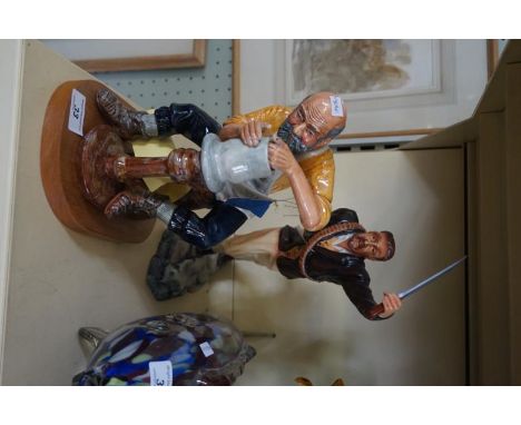 A Michael Sutty figurine of a soldier together with a further ceramic model of pot thrower