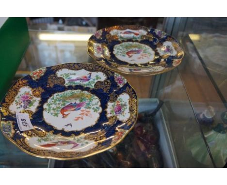 A pair of Booths Royal Scale blue hand painted cabinet plates depicting pheasants in landscape.