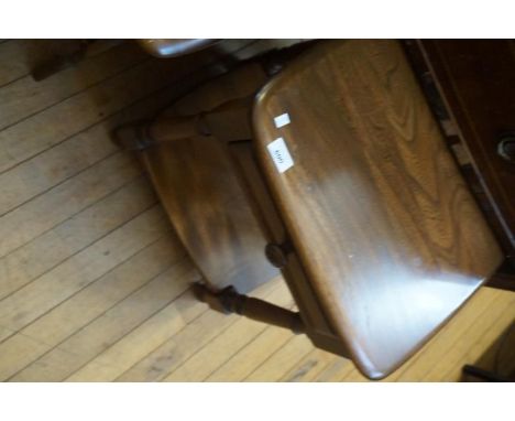 An Ercol medium elm telephone cabinet, having single drawer.