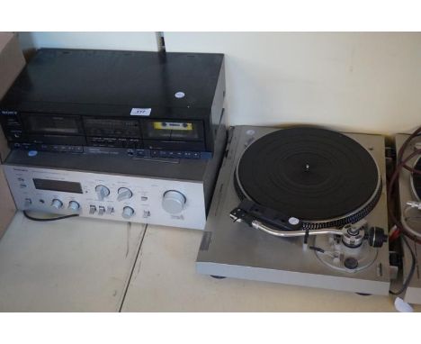 A Technics SLD2 record player together with a TEchnics stereo amplifier and a stereo deck.