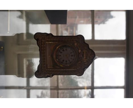 A stylish Sheffield hallmarked silver mantel clock retailled by R Carr.