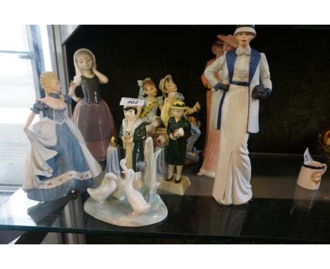 A collection of assorted figurines to include Manner Limited Editions, Nao etc.