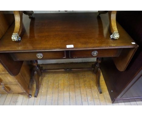 A 20th Century mahogany sofa table having two single frieze drawers.