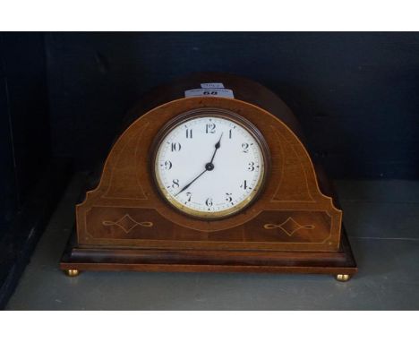 An Edwardian inlaid mahogany mantel clock, with a Swiss buren movement.
