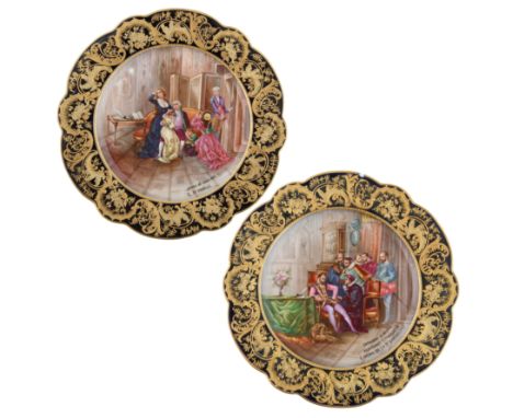 cavetto of each decorated with a gilt foliate and floral pattern against a dark ground, one depicting Catherine de Medicis Ar