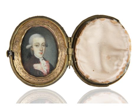 framed under glass in a leather compact with brass-studded detailing, hand-painted miniature profile of a poised victorian Fr