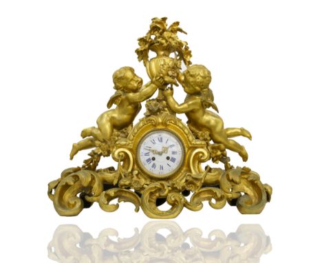 ornate rocaille scrolled base with garland swags, centered the enamel white clock face with Roman and Arabic Numerals, the fa