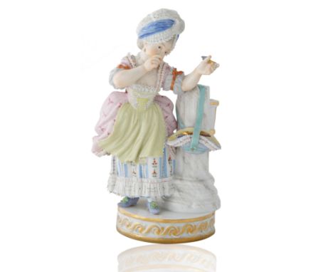 modelled after Michel Victor Acier and J.C. Schonheit, the figurine posed atop a circular moulded base with gilt-edging, stan