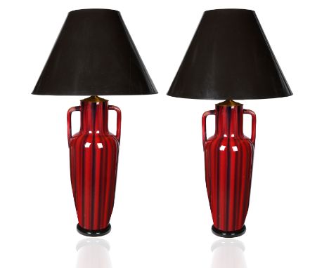the pair each of elongated baluster form, with conforming handles, a deep mauve and purple flambe-glazed body, electrified, w