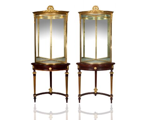 each demi-lune shape, gilt wood beveled legs with a Y shape stretcher bar with a gilt centered finial, the cabinet gilt adorn