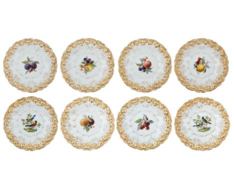 each cavetto with with embossed gilded and painted foliage, each featuring scenes of birds and fruits and wild berries, each 