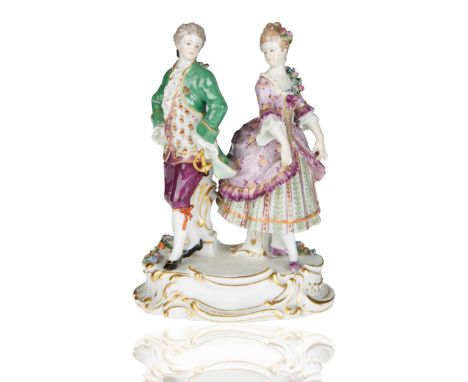 modelled after J.J. Kaendler oval rocaille moulded base with gilt-edging and applied flowers, the couple in dancing position,