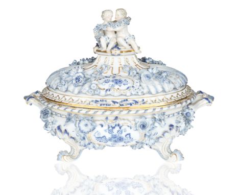 oval formed with rocaille feet and gilt-edging, the body with applied flowers and scrolled acanthus rocaille handles, the cov