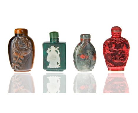 comprising:a) A Green and Red Hard Stone 'Koi Fish' Snuff Bottle, canteen form with a rounded cover, the recto with a carved 