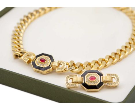 CHRISTIAN DIOR - A gold-tone enamel and paste set pendant necklace and brooch set. The pendant necklace with heavy curb link 