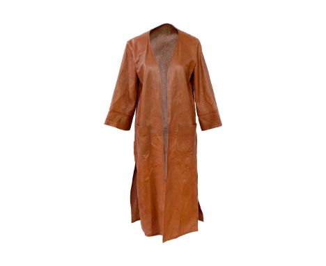 A brown leather trench coat. Collarless with an all-over punchhole design, two patch pockets and side slits, 112cm long.Good 