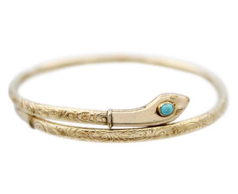 A Victorian gold-plated turquoise set snake bangle. With floral scroll engraved decoration, expanding.The bangle is adjustabl