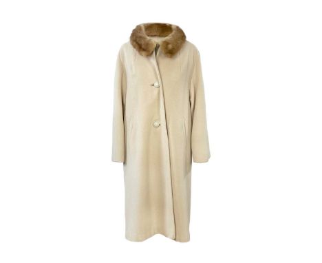 A vintage 100% cashmere ladies beige full length overcoat with fur trim. Length 40".The coat is in good condition,  no damage