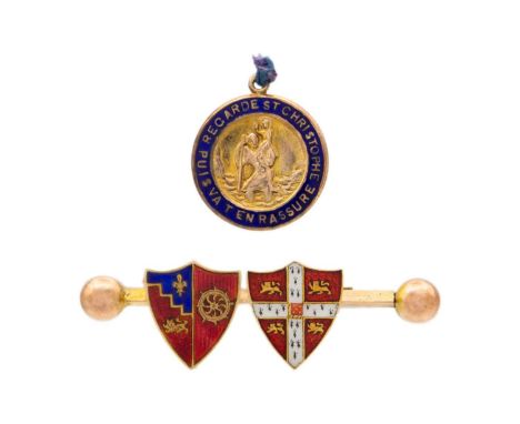 A 9ct armorial enamel shield applied bar brooch and a small 9ct enamel St Christopher pendant. The bar brooch stamped M.B. &a