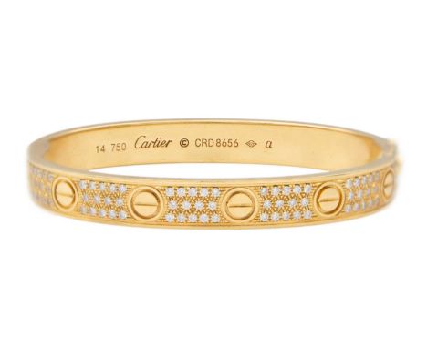 CARTIER - An 18ct rose gold diamond set 'love' bangle. The polished oval band pavé-set throughout with brilliant-cut diamonds