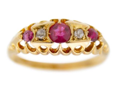 A Victorian 18ct hallmarked gold diamond and ruby set five stone ring. In a boat shaped setting, Chester hallmark, size N, 3.