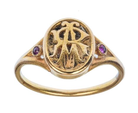 A Victorian gold (tests 18ct) ruby set lady's signet memorial locket ring. The oval head with monogram 'AR', flanked by two m