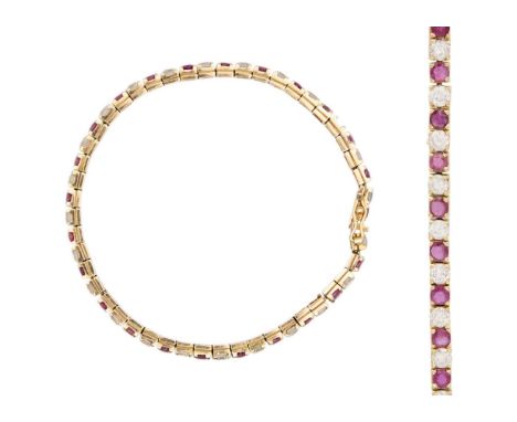 14k gold ruby, white spinel tennis bracelet Stamped 585k on a clasp, length 19cm, 11.7g.