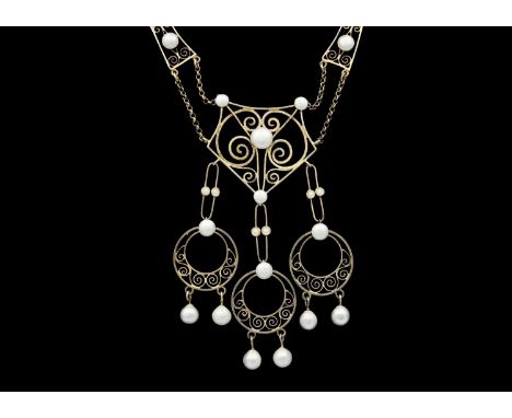 A Norwegian silver gilt and enamel solje pendant necklace, possibly by Marius Hammer. With filligree scrolls and applied with