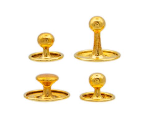 A 9ct four-piece dress shirt button set by OP, within fitted box. Stamped 9ct, total weight 3.1g.In our opinion this set is c