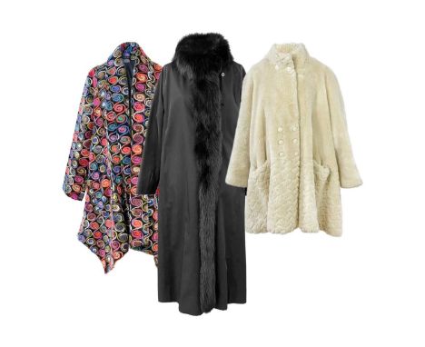 A selection of three ladies designer coats.  To include a faux fur coat by Jean Philippe Ricifriar, size medium, a woolen thr