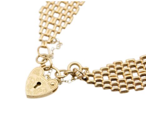 A 9ct hallmarked gold gate link bracelet with padlock clasp. Weight 10.0g.The bracelet is 8" long with 2.5" safety chain, wor