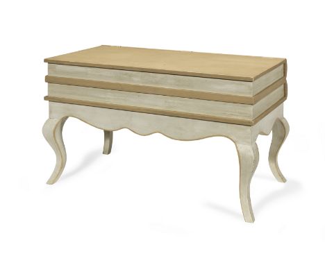 A painted 'book chest' coffee table Designed by Nicky HaslamThe hinged top on cabriole legs, together with a smaller 'book ch