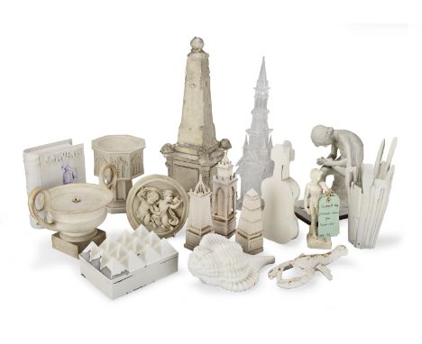 A collection of white painted plaster, ceramic, cardboard and perspex decorative 'Tablescape' objects in the manner of David 