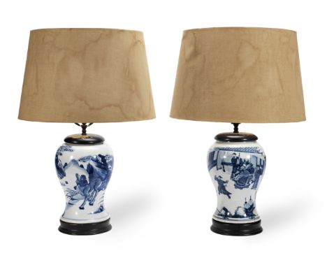 A pair of Chinese export blue and white porcelain vase lamp basesin the Kangxi style, probably 19th centuryThe bodies painted