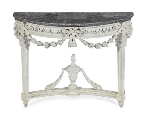 A French 19th century carved and painted console tableIn the Louis XVI styleThe demi-lune marble top with a moulded edge abov