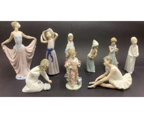 A group of eight Lladro porcelain figurines, together with a Nao porcelain ballerina, tallest H. 30cm.