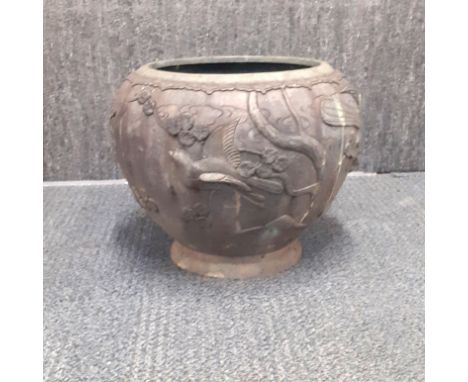 A 19th century Japanese bronze planter with decoration of birds in flight, 32 x 35cm.