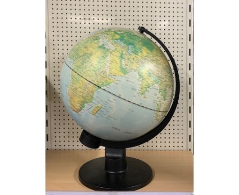 A vintage globe, H. 40cm.