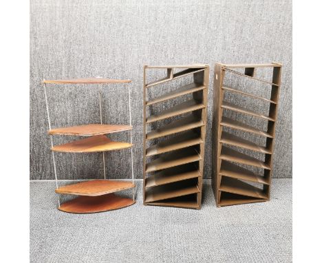 An interesting 1970's sprung shelf unit H. 74cm, Together with two brown painted record shelves, H. 80cm.