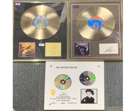 Two framed autographed gold discs, and one unsigned for Celine Dion, The Who and Lisa Stansfield