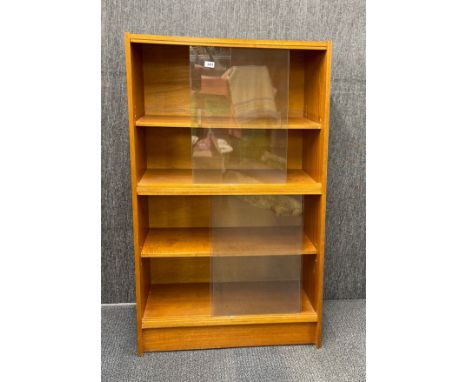 A vintage teak sliding glass door bookcase, 82 x 30 x 160cm.