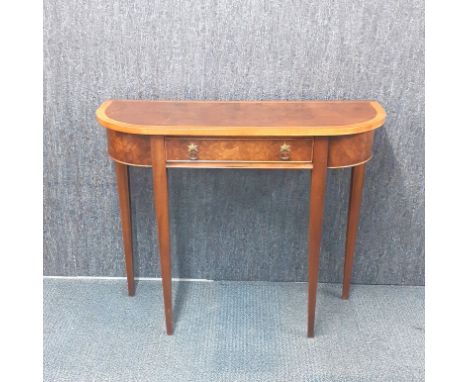 A burr walnut veneered single drawer console table, W. 92cm.