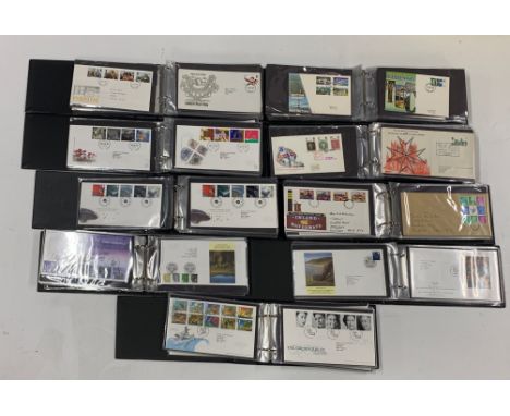 Nine albums of GB first day covers.