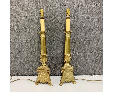 A brass column table lamp and shade, overall H. 86cm.