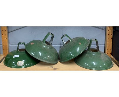A set of four Coolican enamelled metal ceiling light shades, Dia. 29cm.