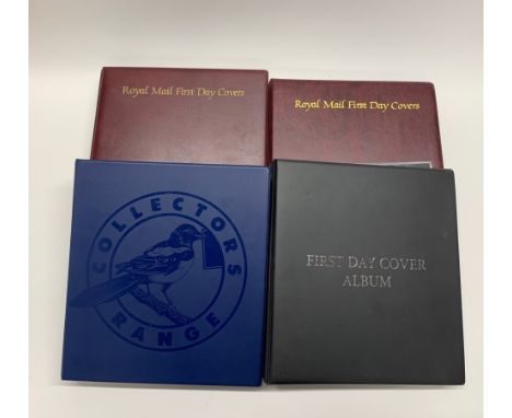 Four albums of Royal Mail first day cover stamps.