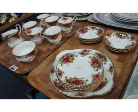 Two trays of Royal Albert bone china 'Old Country Roses' teaware items comprising: cups and saucers; milk jug; sucrier; sandw