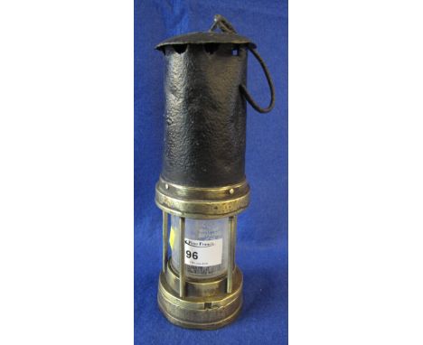 Original brass miner's safety lamp.