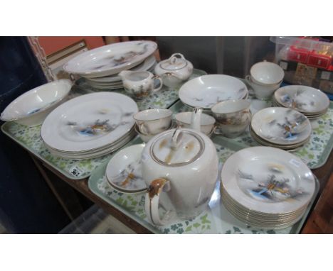 Four trays of Japanese 'Miyuki' china tea and dinnerware items decorated with landscape scenes comprising: teacups; saucers; 